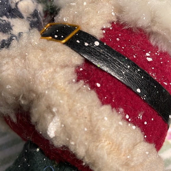 Father Christmas stands proudly with his fluffy beard, pine branches and snow - Picture 9 of 10